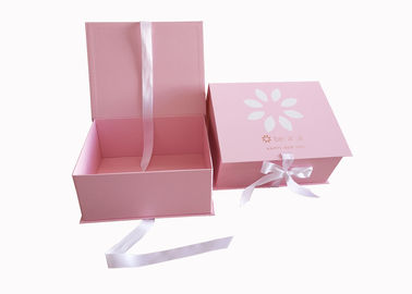 Pink Cardboard Cosmetic Packaging Foldable Gift Boxes Ribbon Closure For Skin Care supplier