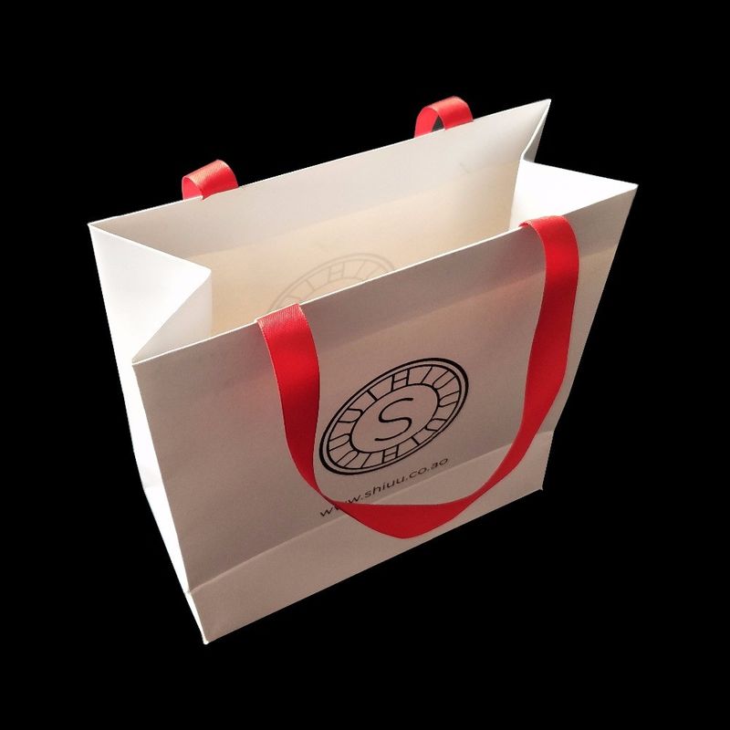White 300 Gsm Matte Paper Shopping Bags Matte Lamination With Ribbon Handle supplier